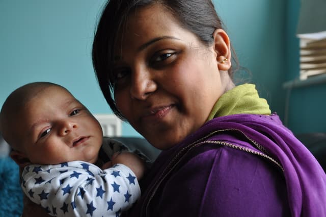 Mother holding baby